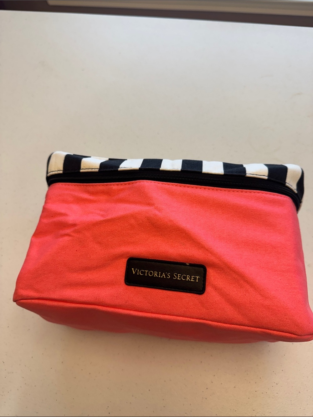 Victoria's Secret Coral Pink Cosmetic Bag with Black & White Stripe Trim